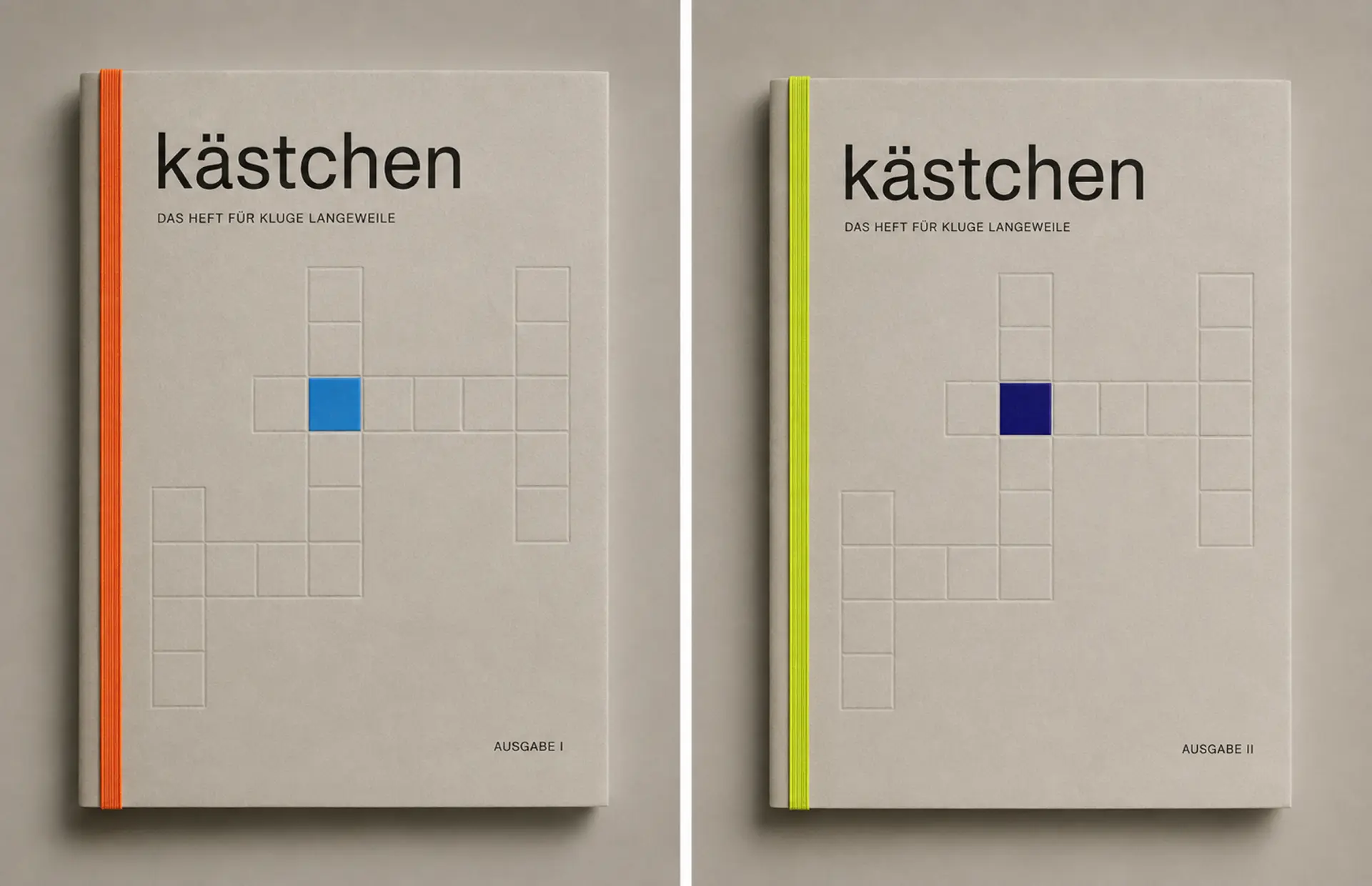 Zwei Ausgaben von kästchen mit geprägtem Rastermotiv, orangefarbener und limettengrüner Buchbindung